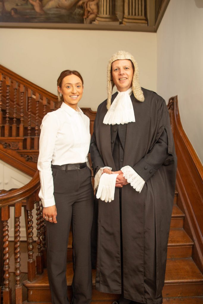 KC Barrister standing on stairs with clerk