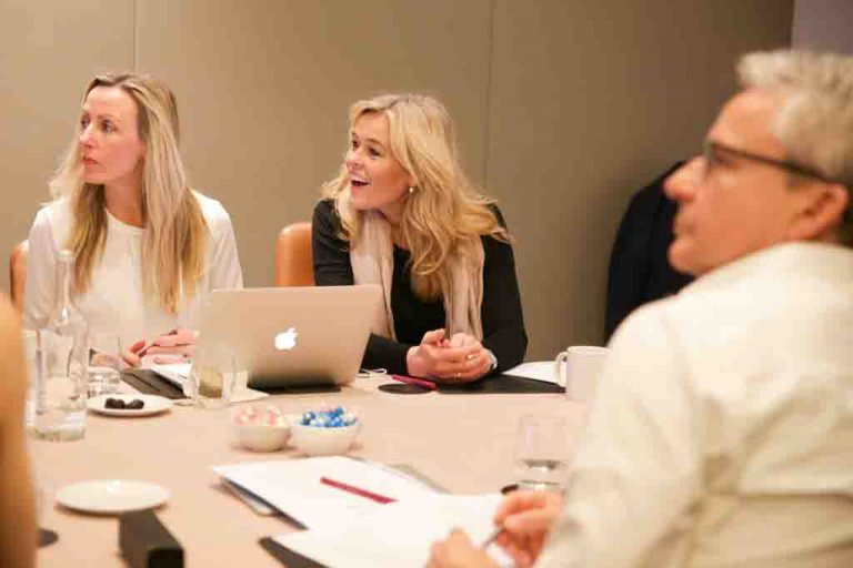 People at a desk in an office