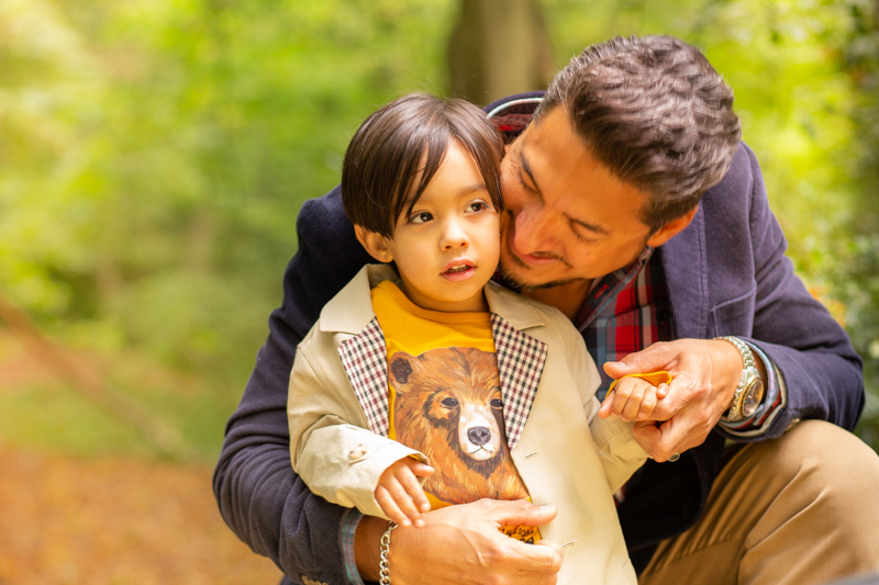 father and little son in the woods